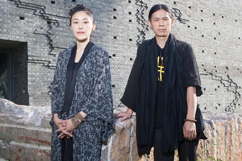 RongRong and Inri in the courtyard of their Three Shadows gallery in Caochangdi