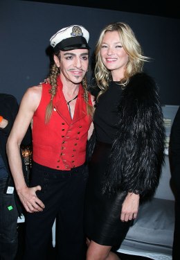 John Galliano and Kate Moss pose for a photo at Dior Ready to Wear Spring-Summer 2010 Fashion Show in Paris, Oct. 01, 2010.