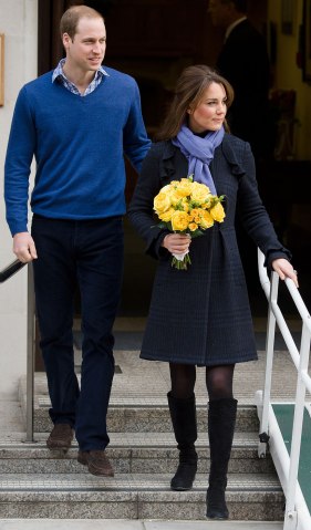 image: Prince WiIliam, the Duke of Cambridge, leaves King Edward VII hospital with his wife Catherine, the Duchess of Cambridge in central London, Dec. 6, 2012.